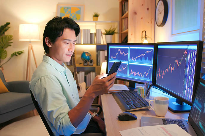 Man monitoring the stock market