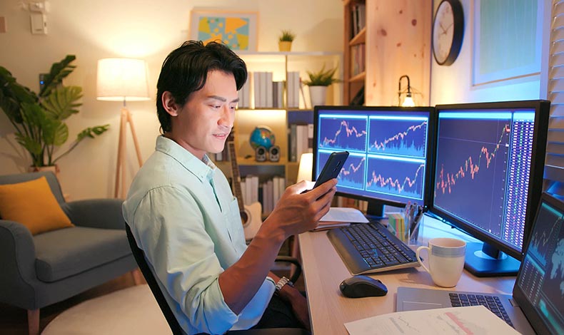 Man monitoring the stock market