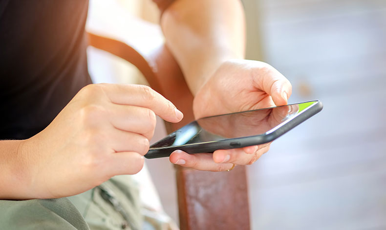 Person browsing in their mobile phone