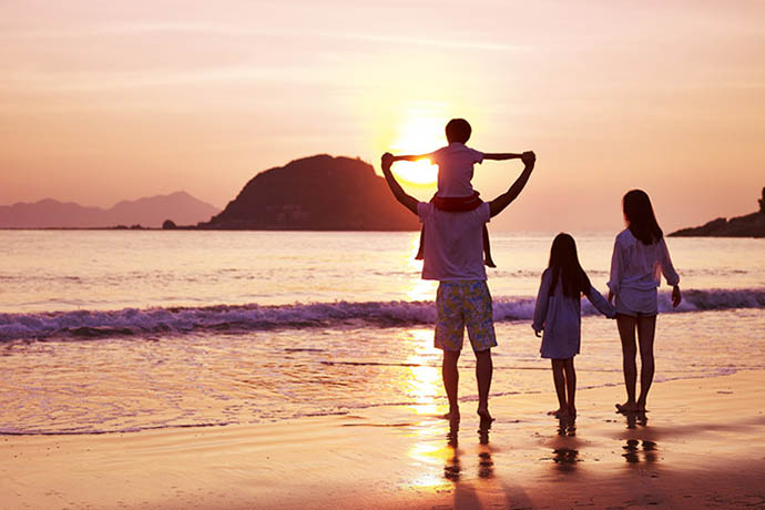 Family by the beach