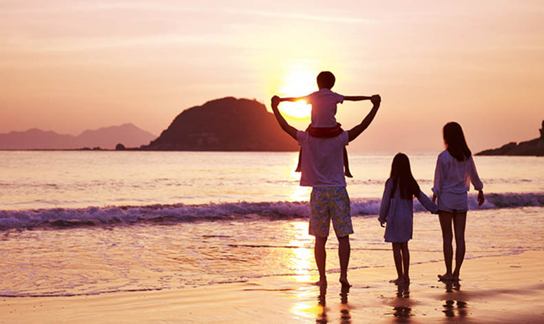 Family by the beach